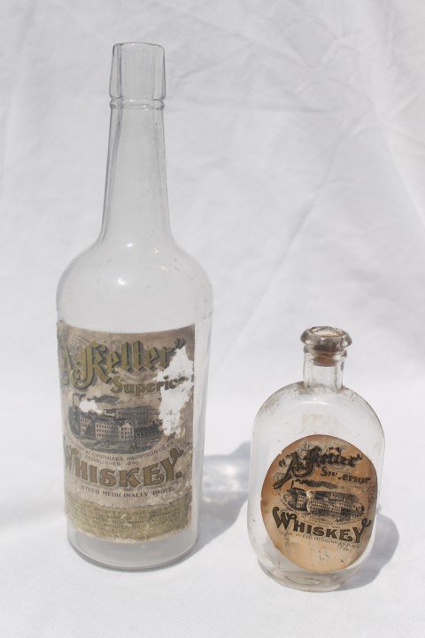 A. Keller Superior Whiskey Cynthiana, KY Guaranteed: A. Keller Superior Whiskey Cynthiana, KY Guaranteed Medicinally Pure. Fifth with partial label; small with wear.