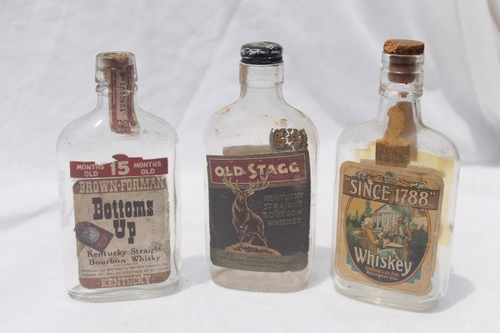 Bottoms Up Kentucky Straight Bourbon Whiskey,: Bottoms Up Kentucky Straight Bourbon Whiskey, Louisville, half pint, partial tax stamp,, some wear; Old Stagg Kentucky Straight Whiskey, Frankfort, half pint, tax stapm, back label with some wear; Sin
