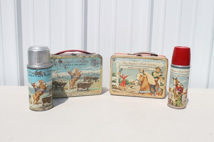 Roy Rogers and Dale Evans lunch boxes with thermos,: Roy Rogers and Dale Evans lunch boxes with thermos, both with loss and wear. "Punk" scratched on one.