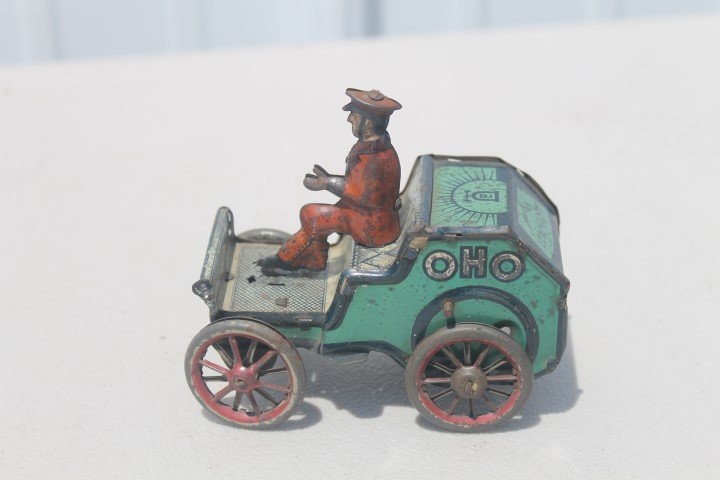 Lehmann OHO tin wind-up toy, back wheel damage, drive: Lehmann OHO tin wind-up toy, back wheel damage, drive loose, expected loss.