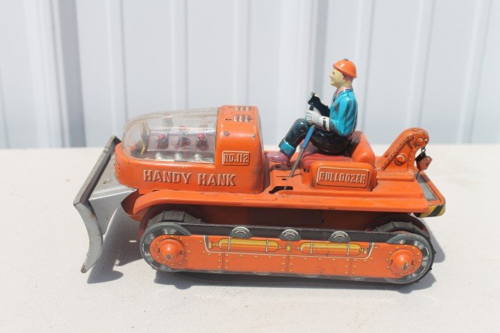 Lighted Mystery Tractor box with Handy Hank No. 112 Bul: Lighted Mystery Tractor box with Handy Hank No. 112 Bulldozer, battery operated, Made in Japan, with one loose track. With box.