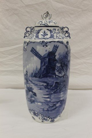Pairpoint Limoges hand painted covered urn with Delft: Pairpoint Limoges hand painted covered urn with Delft farm scene. Minor flake on interior base rim. Lid has been professionally restored.