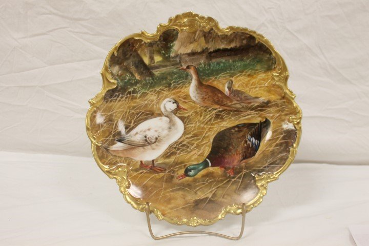 B&H Limoges 12 1/4" charger with ducks. Gold border: B&H Limoges 12 1/4" charger with ducks. Gold border with some wear.
