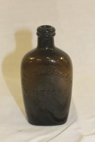 Olive green Westford Glass Co. half pint flask with: Olive green Westford Glass Co. half pint flask with shock of wheat. 5 7/8" tall