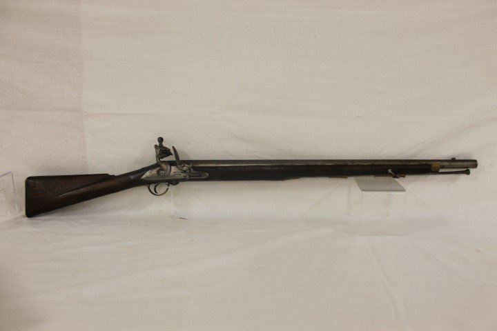 Replica flintlock Sargent's musket with brass mounts: Replica flintlock Sargent's musket with brass mounts and butt plate, marked Barnett, London. App. 46 1/2" long.