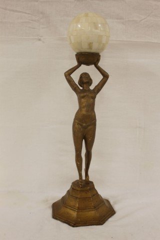 Art Deco semi-nude painted metal figure with pieced: Art Deco semi-nude painted metal figure with pieced bone sphere on top. Outstretched hands appear to have been broken from figure and re-attached. Base is numbered 40B.