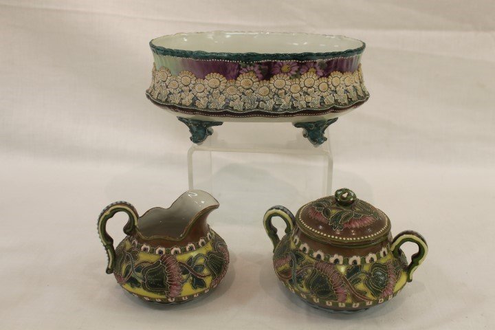 Nippon blue maple leaf 4-footed planter with moriage: Nippon blue maple leaf 4-footed planter with moriage floral and beaded decoration, app. 8 3/4' lone, 3 5/8" tall and 6 1/2" wide. Loss on on flower center. With an unmarked creamer and covered sugar w