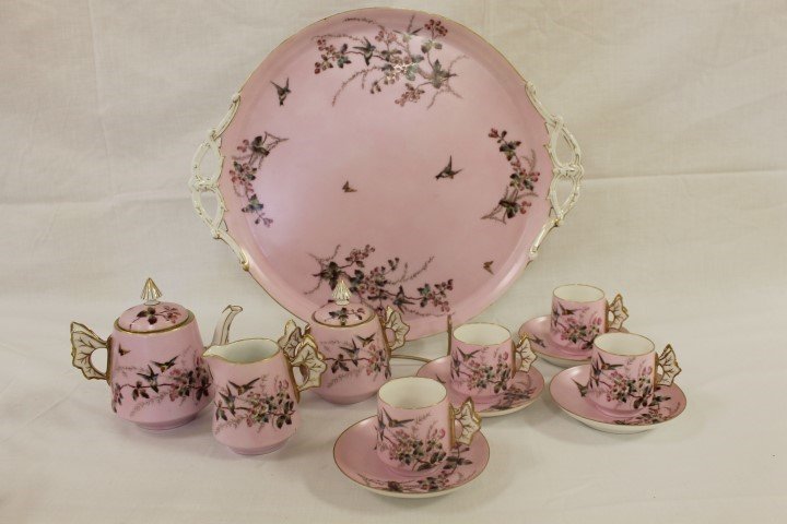 Charles Haviland CFH GDM Old Paris style butterfly: Charles Haviland CFH GDM Old Paris style butterfly handle tea service decorated on a pink ground with berries, birds, flowering vines and butterflies. Minor glaze flake on teapot spout, minute nick on