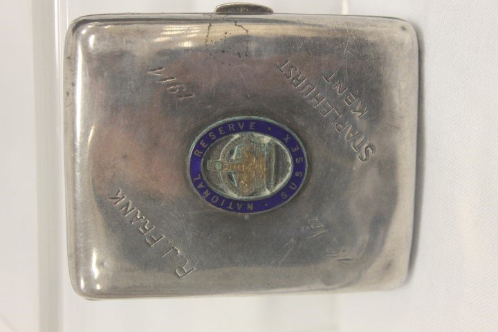 British sterling silver cigarette case with enamel: British sterling silver cigarette case with enamel medallion with Sussex National Reserve emblem, with front engraved "R.J. Kent Staplehurst Kent 4th Nov. 1914", and back engraved "Return to Mr. Frank