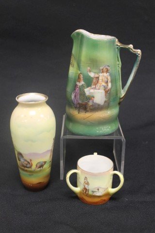 (3) pieces Royal Bayreuth: 6" vase with a man with: (3) pieces Royal Bayreuth: 6" vase with a man with turkeys - minor loss near base; 2 1/4' 3-handle toothpick with lady with geese - small rim nick and light line from rim; 6 3/8" pitcher with Cavalier