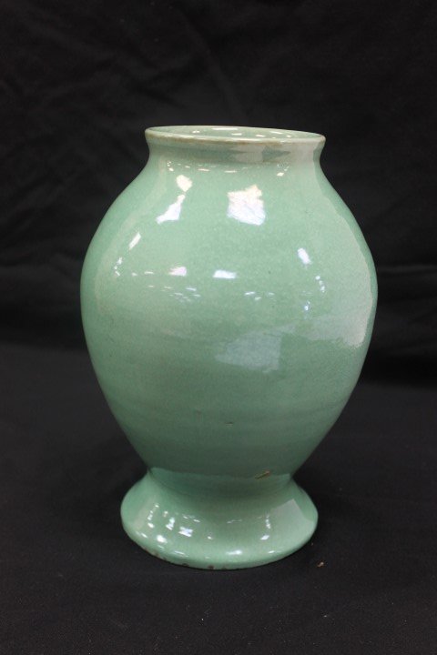 Cornelison Pottery 9 1/4' bulbous vase with minor base: Cornelison Pottery 9 1/4' bulbous vase with minor base chips and blow out. Impressed base mark.