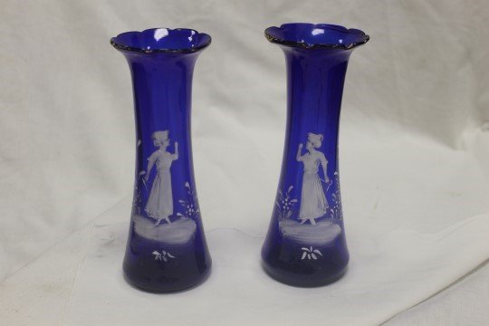 Pair of 7 3/8" Mary Gregory cobalt crimped rim vases: Pair of 7 3/8" Mary Gregory cobalt crimped rim vases with gold trim. Some wear.