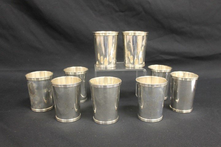 (9) International sterling silver 101-25-1 julep cups,: (9) International sterling silver 101-25-1 julep cups, one with minor dent, minor scratching. App. 35.015 troy ounces.