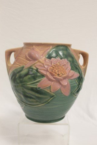 Roseville Water Lily 8 1/4" cookie jar base with minor: Roseville Water Lily 8 1/4" cookie jar base with minor rim nicks.