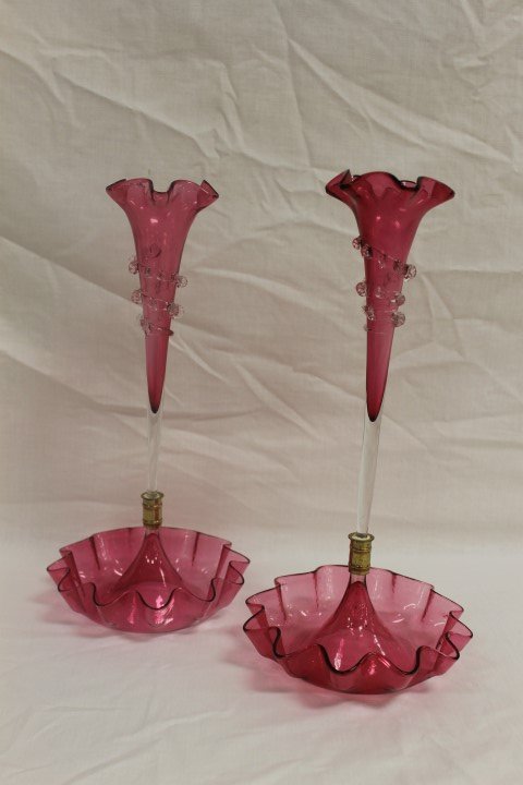 (2) 15 1/2" cranberry single flute epergnes with: (2) 15 1/2" cranberry single flute epergnes with applied rigaree decoration.