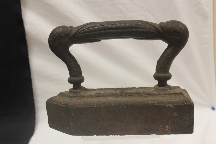 Cast iron "Crows Eating Corn" industrial iron, 10 3/4": Cast iron "Crows Eating Corn" industrial iron, 10 3/4" long.