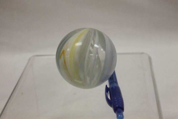 2 1/4" ribbon core swirl marble with white and yellow: 2 1/4" ribbon core swirl marble with white and yellow slag swirl bands