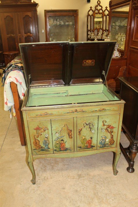 Victrola Japanned case with all-over decoration: Victrola Japanned case with all-over decoration, on cabriole legs. No works or speakers. With some loss. 35 1/2" tall, 33" wide, 23" deep