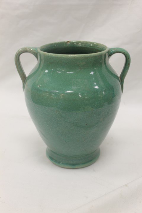 7 1/2" Waco 2-handle vase, green, with small chip on: 7 1/2" Waco 2-handle vase, green, with small chip on inner rim, unmarked.