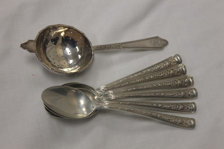Sterling silver items: Lunt "Chateau/Chateau Thierry": Sterling silver items: Lunt "Chateau/Chateau Thierry" 1919 tea strainer; (6) Watson "Windsor Rose" teaspoons, 7.21 toz.