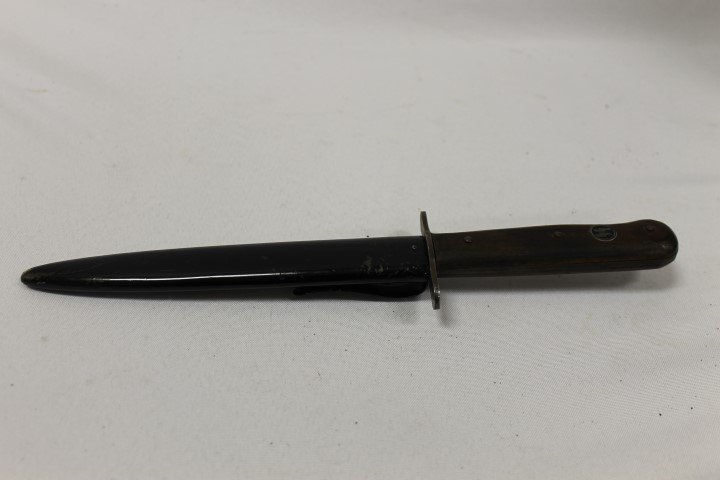 German WWII fighting boot knife. Handle with inset SS: German WWII fighting boot knife. Handle with inset SS insignia, 11 1/2".