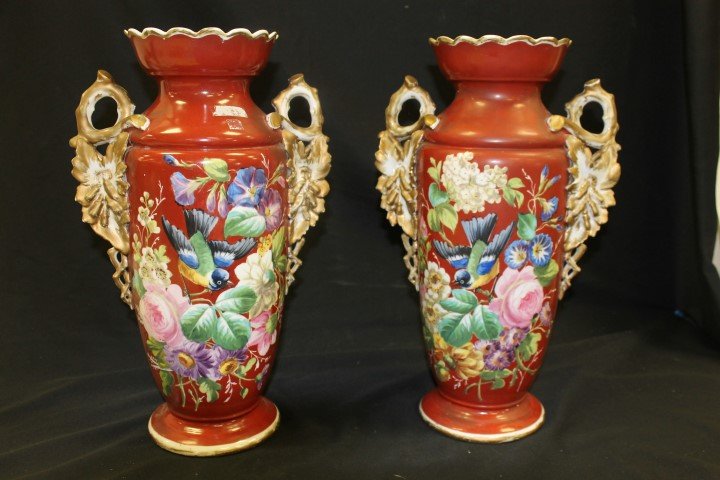 Pair of 16 3/4" Old Paris porcelain vases with gold: Pair of 16 3/4" Old Paris porcelain vases with gold leaf and vine handles and bird and floral decoration. Extensive restoration and overpainting on leaf forms and handles, one vase with restoration in