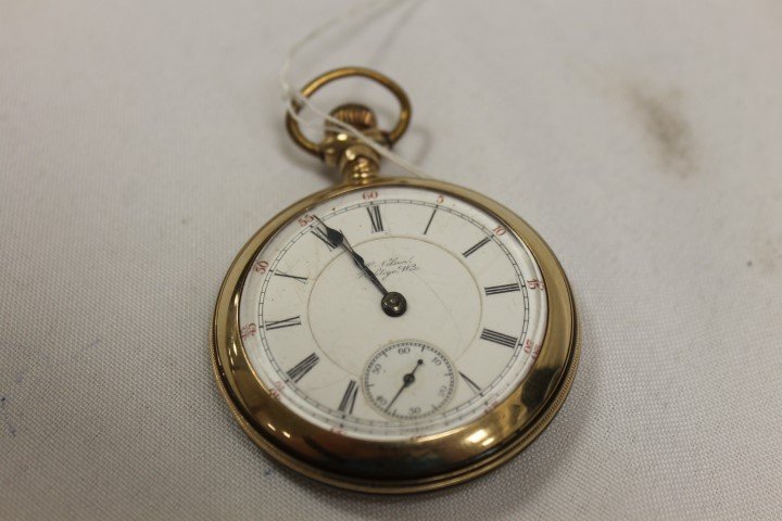 Hamilton porcelain face pocket watch, 18 size, face: Hamilton porcelain face pocket watch, 18 size, face marked P. Nelson Pishtigo, Wis., with etched locomotive on back, N.A.W.C.O. 20 Year Warranted case, 925197, with Hamilton Watch Co. 17 jewel works, 