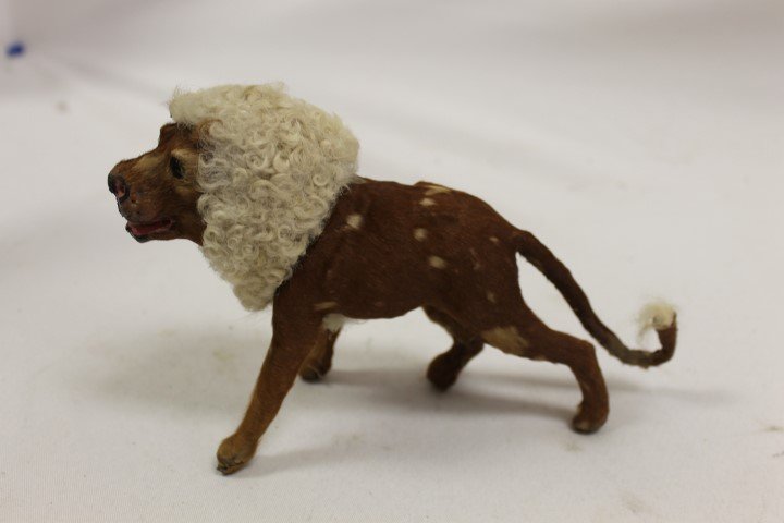 Vintage Lion toy with papier mache open mouth, stitched: Vintage Lion toy with papier mache open mouth, stitched hide cover, and hair mane and tail tip. 8" long, 5" tall
