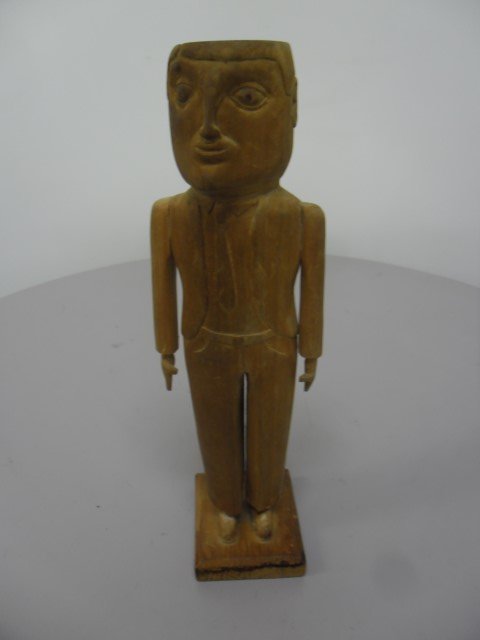 Edgar Tolson, noted KY folk artist, male figure in coat: Edgar Tolson, noted KY folk artist, male figure in coat and tie, c. late 1960's. Given to Tolson's barber in the late 1960's, Tolson added the part in the hair for his barber. Acquired from the Barber