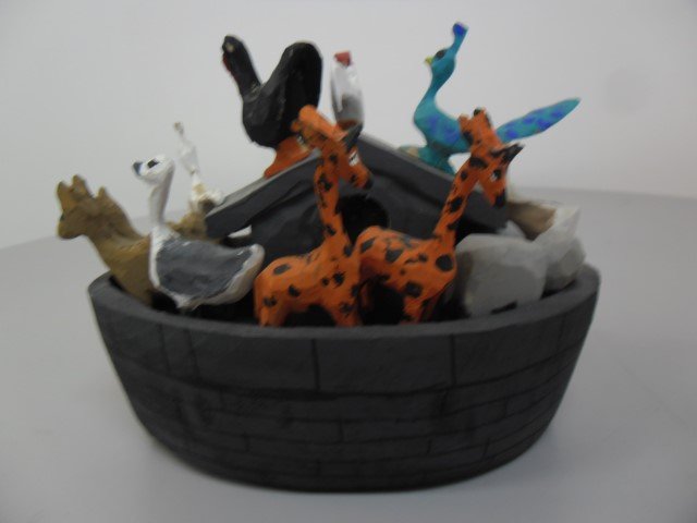 Guy & Dollie Skaggs "Noah's Ark" with 16 animals and: Guy & Dollie Skaggs "Noah's Ark" with 16 animals and Noah. Signed "Guy and Dollie Skaggs" in script. 7 1/4" X 6"