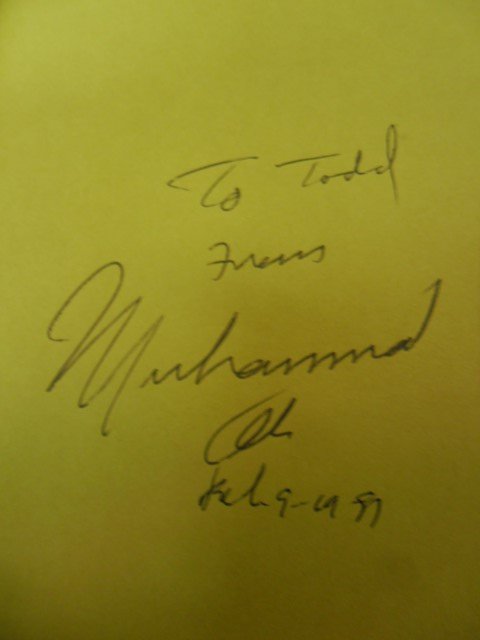 Muhammad Ali autographed book "Prayer and Al-Islam".: Muhammad Ali autographed book "Prayer and Al-Islam". Signed "To Todd from Muhammad Ali, Feb. 9, 1987(?)".