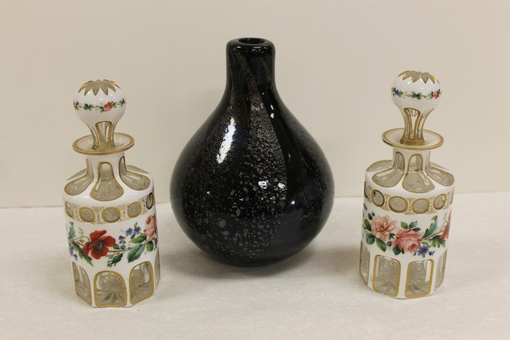 Bulbous art glass vase with flowing metallic: Bulbous art glass vase with flowing metallic decoration, and pair of white cut-to-clear colognes with floral decoration and minor base chips.