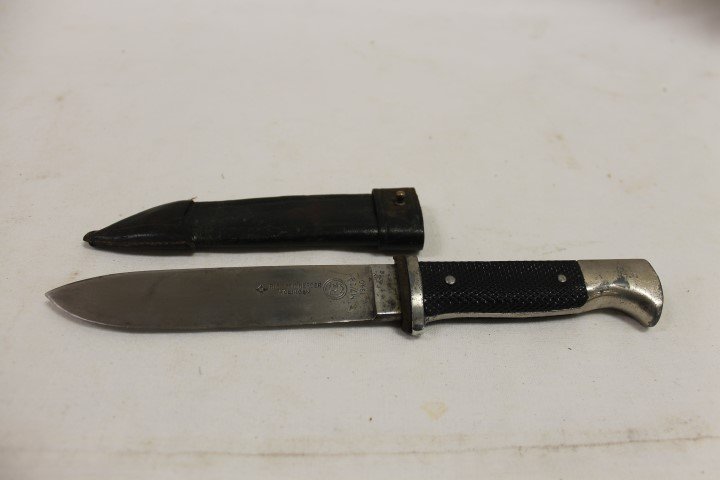 Transitional Hitler Youth knife marked Richard Abr.: Transitional Hitler Youth knife marked Richard Abr. Herder Solingen and RZM M7/18 1940 with period leather sheath with remains of Party eagle stamp. Shortened cross guard, some enamel missing, great b