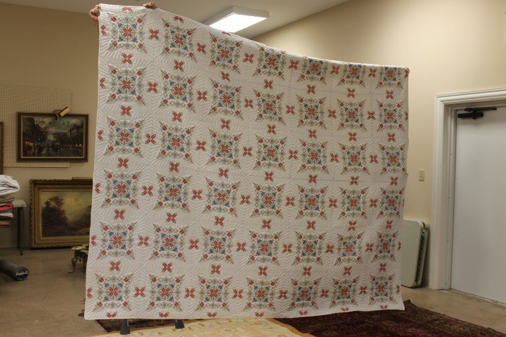 Cross stitch quilt with snow flake blocks and "X": Cross stitch quilt with snow flake blocks and "X" separator, 119" X 99". Small stain on side.