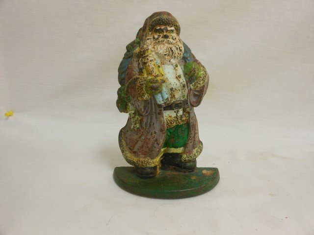 Cast iron Santa doorstop, 8 1/2" X 5 1/2", polychrome: Cast iron Santa doorstop, 8 1/2" X 5 1/2", polychrome paint, newer