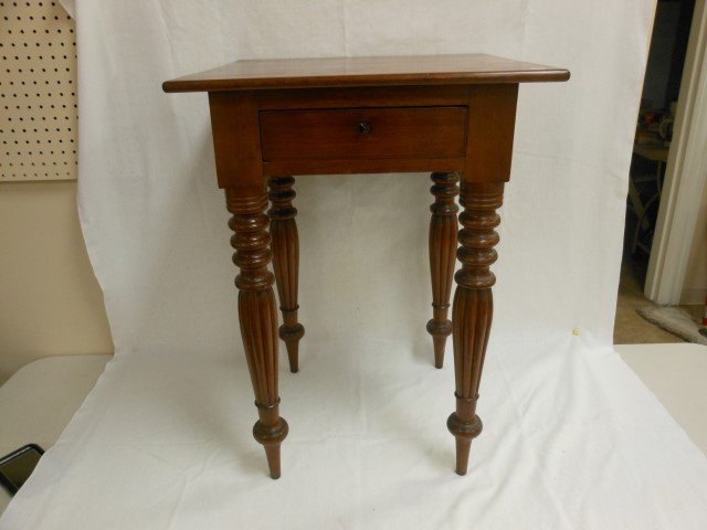 Cherry one drawer nightstand with ring turned and: Cherry one drawer nightstand with ring turned and reeded bulbous legs, split board top. Replaced lock with key, banded drawer, 29 1/4" tall, 21" wide, 20 1/4" deep.