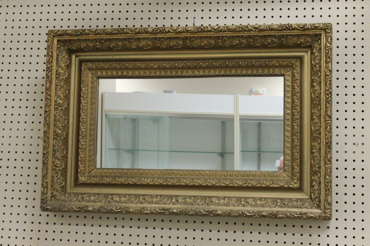 Early walnut spool turned Victorian youth poster bed: Victorian gesso framed mirror, app. 22 1/2" tall, 34 1/2" long. Fantastic frame is app. 6" wide and 4" deep.