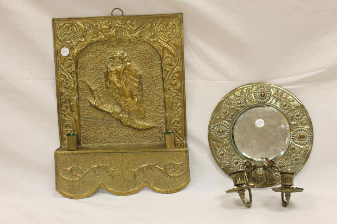 Embossed brass hanging candle stand with stippled: Embossed brass hanging candle stand with stippled background and modled owl on branch, 11 1/4" wide, 15 1/2" tall; brass wall sconce with embossed florals and stippled background, round beveled mirror