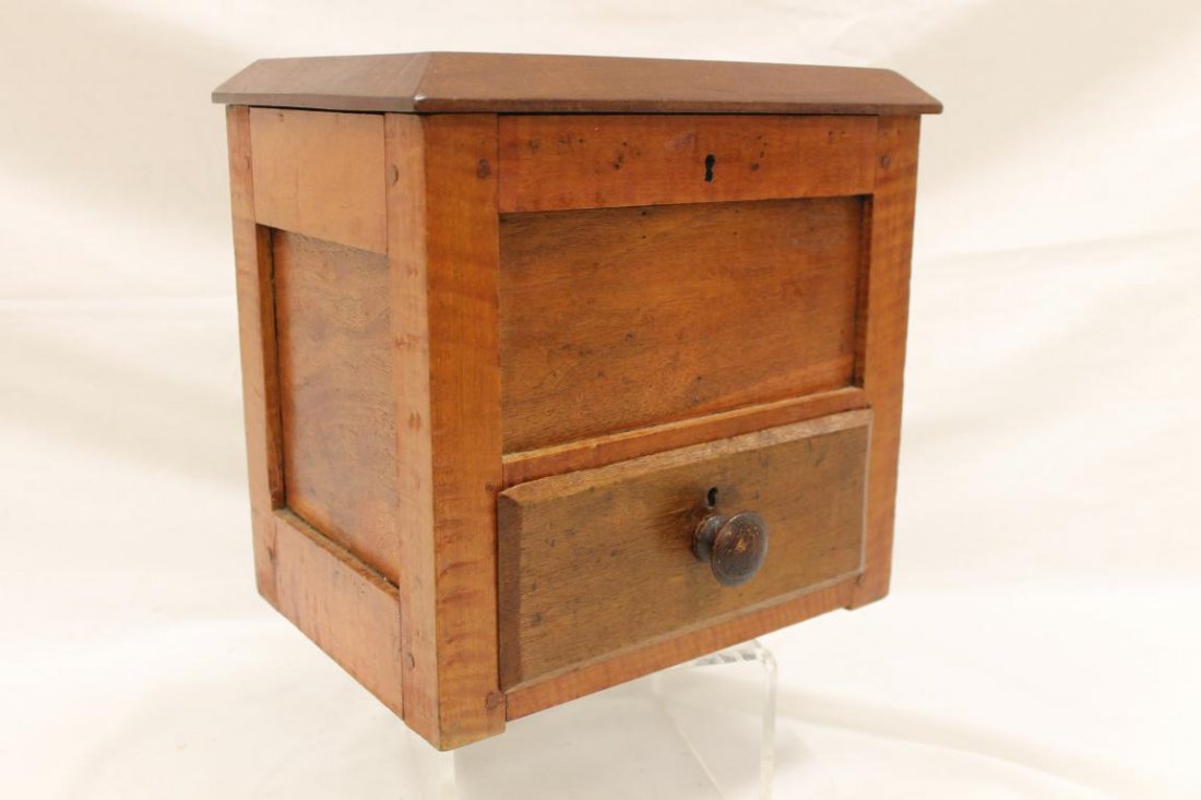 Unusual primitive mixed wood sugar box with locking: Unusual primitive mixed wood sugar box with locking lift top and single locking drawer. 10 3/8" wide, 10" tall, 7 1/2" deep, with champhered top and side interior panels. Stained tiger maple frame wit