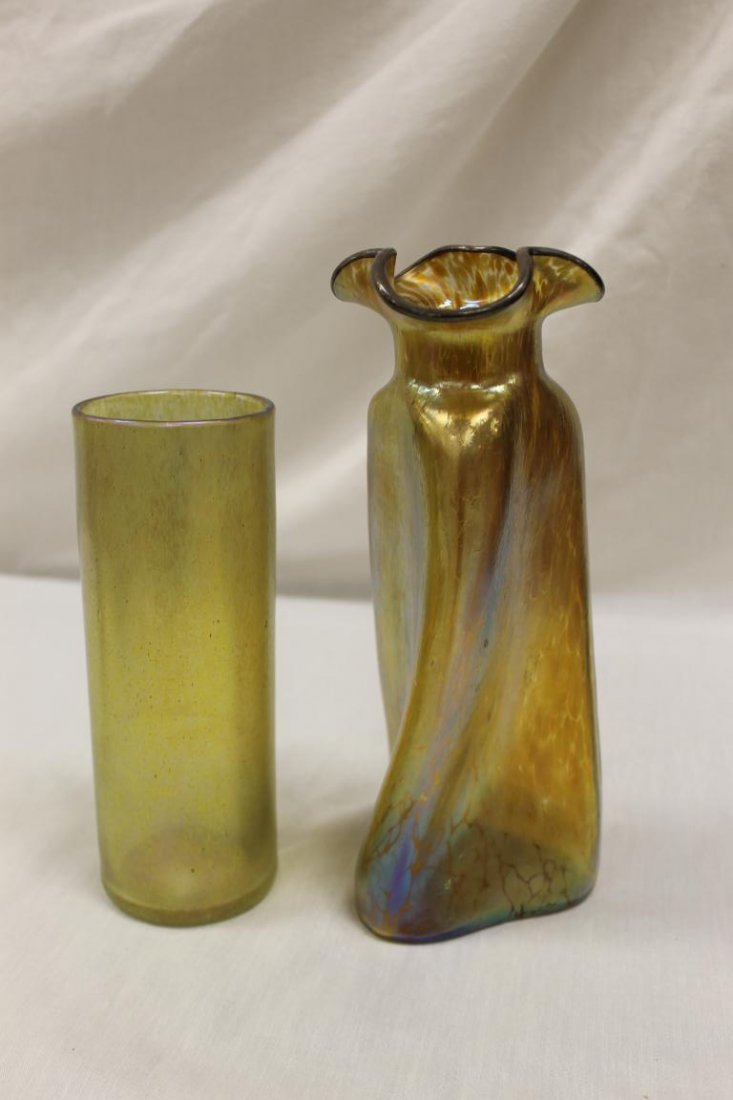 (2) Loetz style vases, tallest is 9 3/4" twisted three: (2) Loetz style vases, tallest is 9 3/4" twisted three corner vase with silver rim and tri-con top, with smaller 7 5/8" cylinder vase.