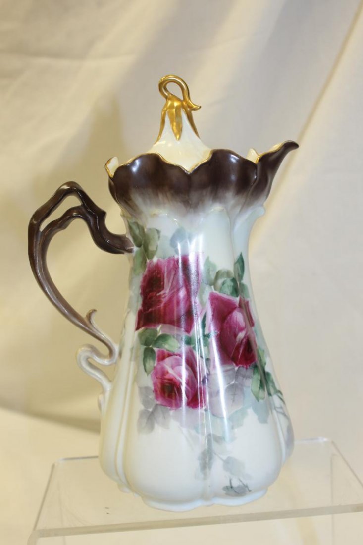 Unmarked RS Prussia Morning Glory or Onion mold 502: Unmarked RS Prussia Morning Glory or Onion mold 502 chocolate pot with rare hand painted rose decoration signed P. Sode. Minor gold loss on finial, 9 1/4".
