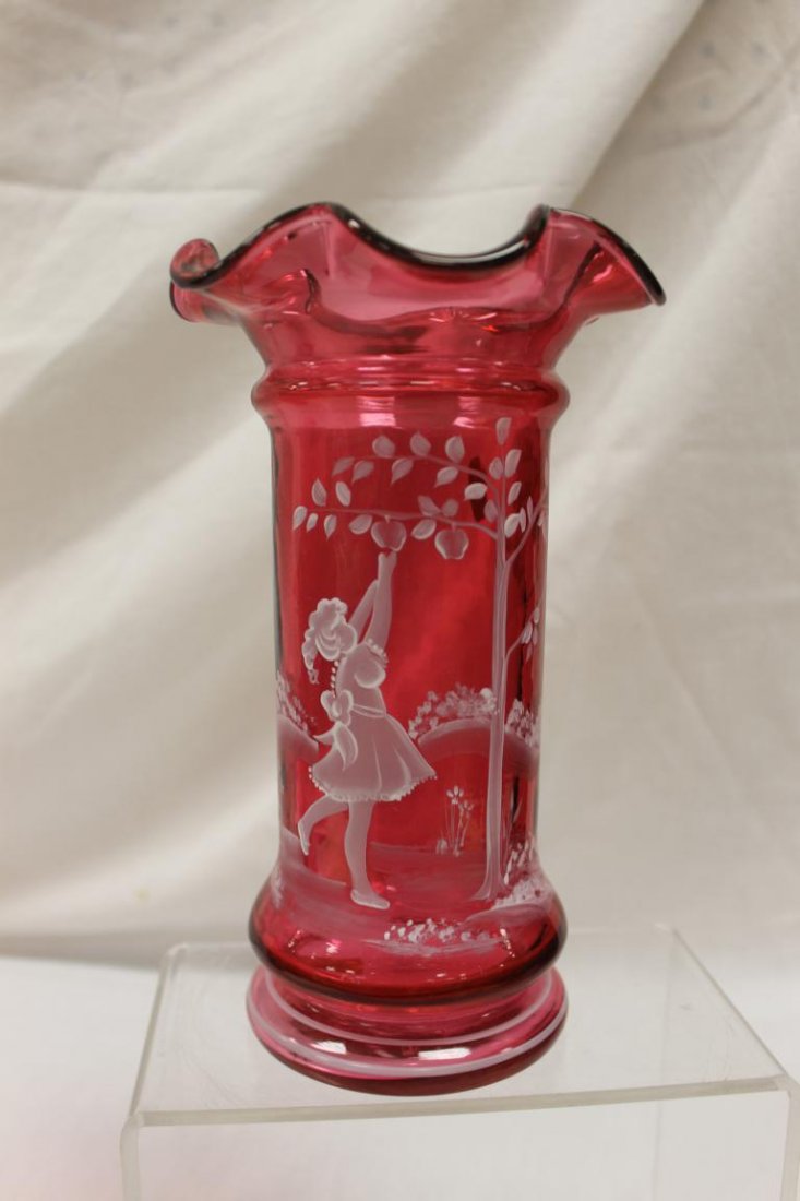 Fenton 9 1/8" ruffle top cranberry vase with Mary: Fenton 9 1/8" ruffle top cranberry vase with Mary Gregory style decoration of a young girl picking an apple from a tree. Marked "hand painted by S. Stephens", #1914/22350