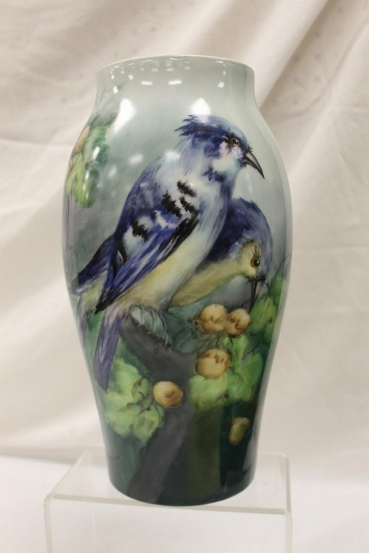 12 7/8" T&V Limoges vase with exceptional blue jay and: 12 7/8" T&V Limoges vase with exceptional blue jay and scorn, leaf and branch all-over decoration, signed B. Ocheltrec 1912. Minor base flake.