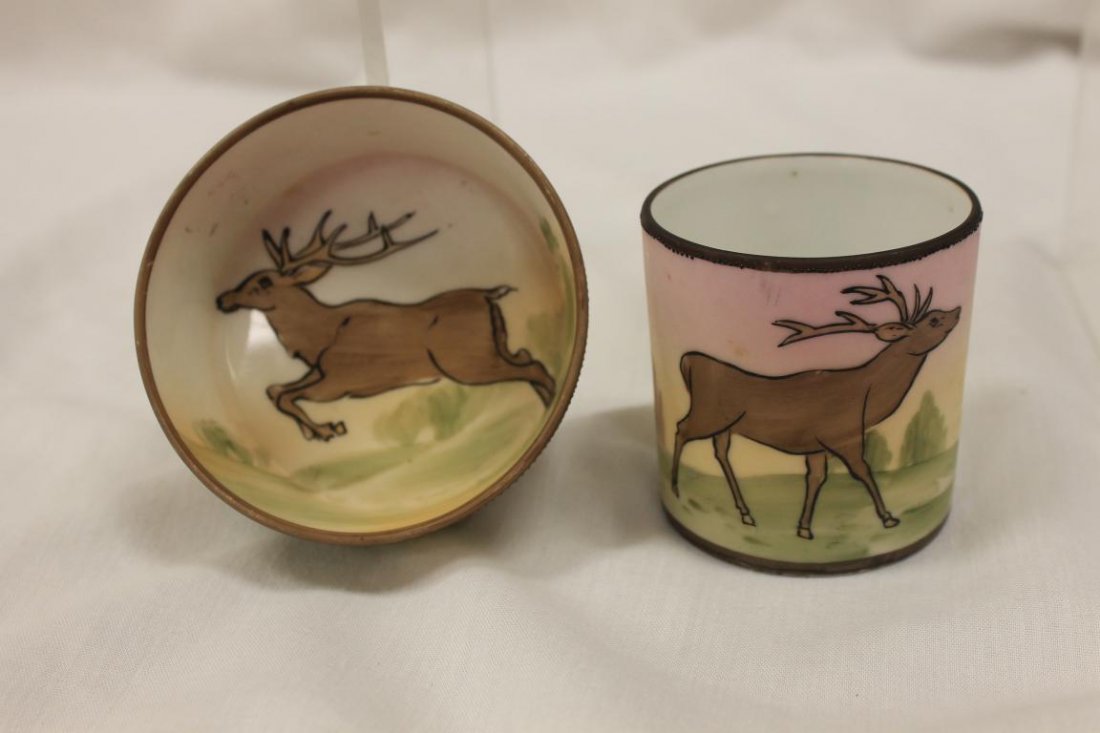 Green M with wreath Nippon ash bowl and cigarette: Green M with wreath Nippon ash bowl and cigarette holder with Stag deocration. Cigarette holder is 2 1/2" tall.