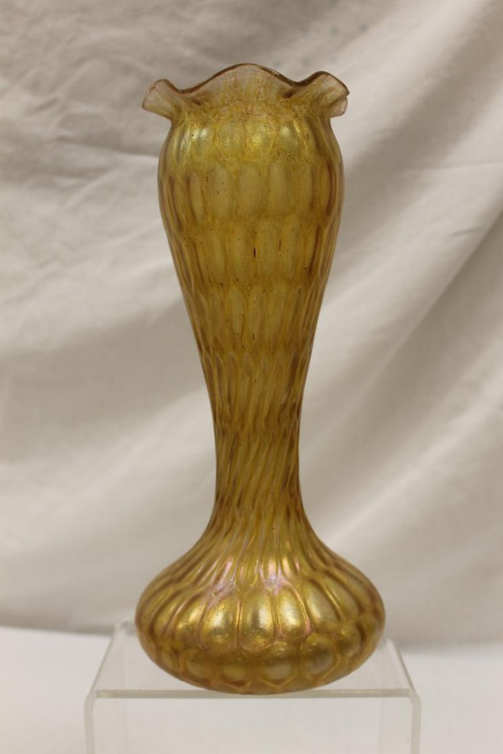 Fine Loetz style amber irridescent vase with twist body: Fine Loetz style amber irridescent vase with twist body with elongate oval thumbprints design, app. 12 1/4' tall.