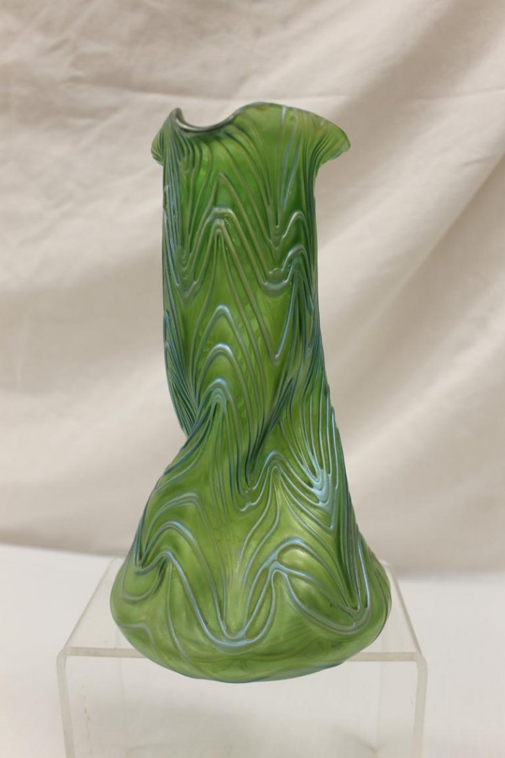 Fine Loetz style blue/green twisted body vase with: Fine Loetz style blue/green twisted body vase with applied blue exterior lines and tri-con top, app. 9 3/4"
