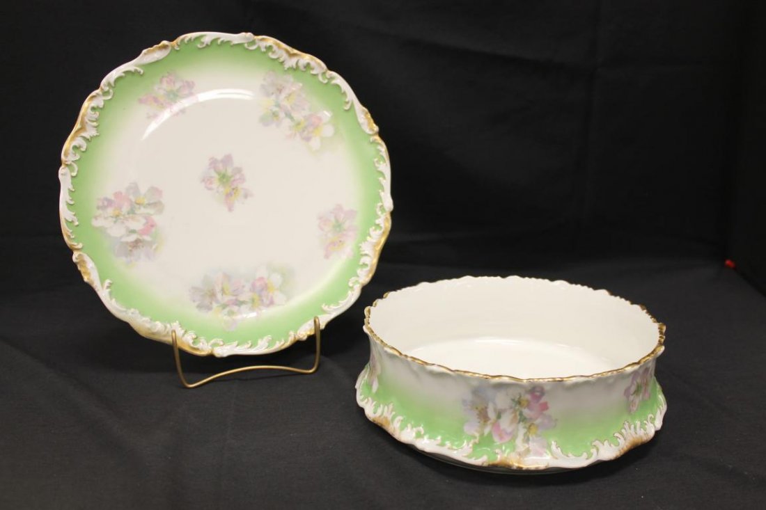 Pitkin & Brooks T&V Limoges 12 1/2" scroll border: Pitkin & Brooks T&V Limoges 12 1/2" scroll border charger and 10 1/4" X 3 1/4" low center bowl with sponge gold highlights and floral decoration on a white to green background.