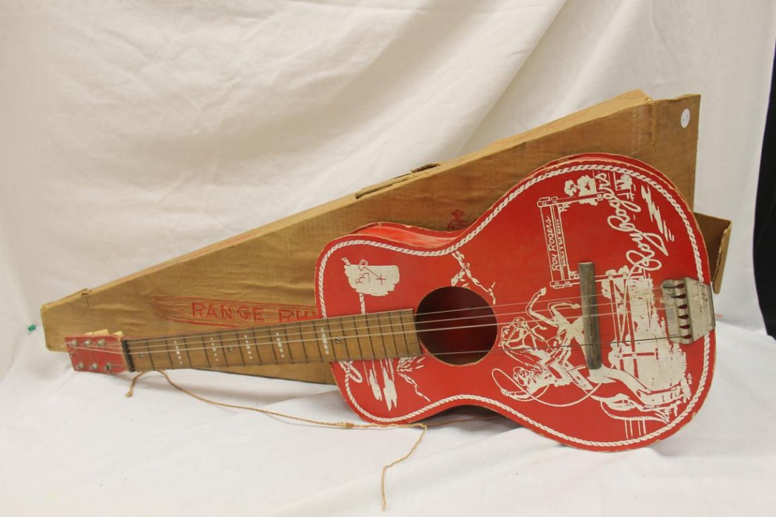 Range Rhythm Toys Roy Rogers 1950's guitar in original: Range Rhythm Toys Roy Rogers 1950's guitar in original box. Needs to be restrung, expected wear.
