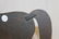 Mounted sheet iron horse on wooden base, with strap at - 3