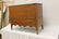 Fine walnut sugar chest with scalloped apron and single